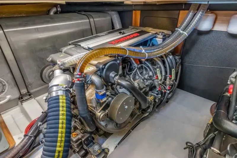 Slide: The Image of Engine room of 2024 Beneteau Swift Trawler 41 Fly, showcasing Yanmar engine components. - 37