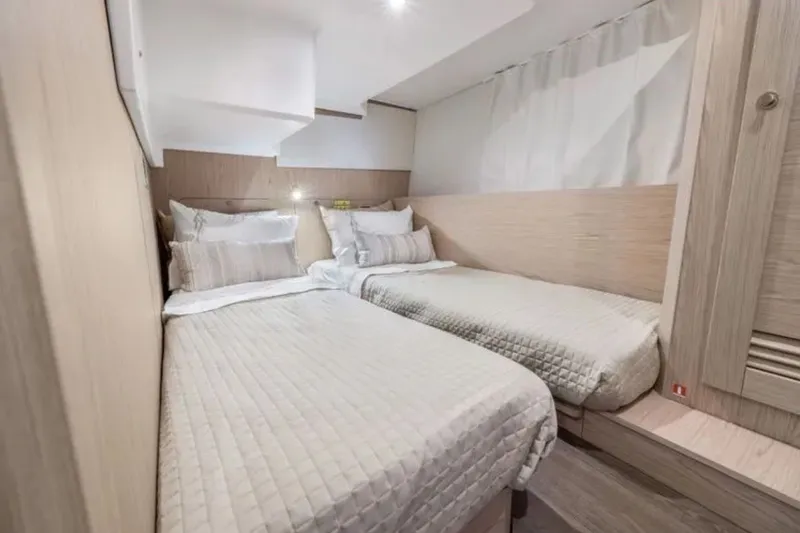 Slide: The Image of Interior cabin of 2024 Beneteau Swift Trawler 41 Fly with twin beds. - 42