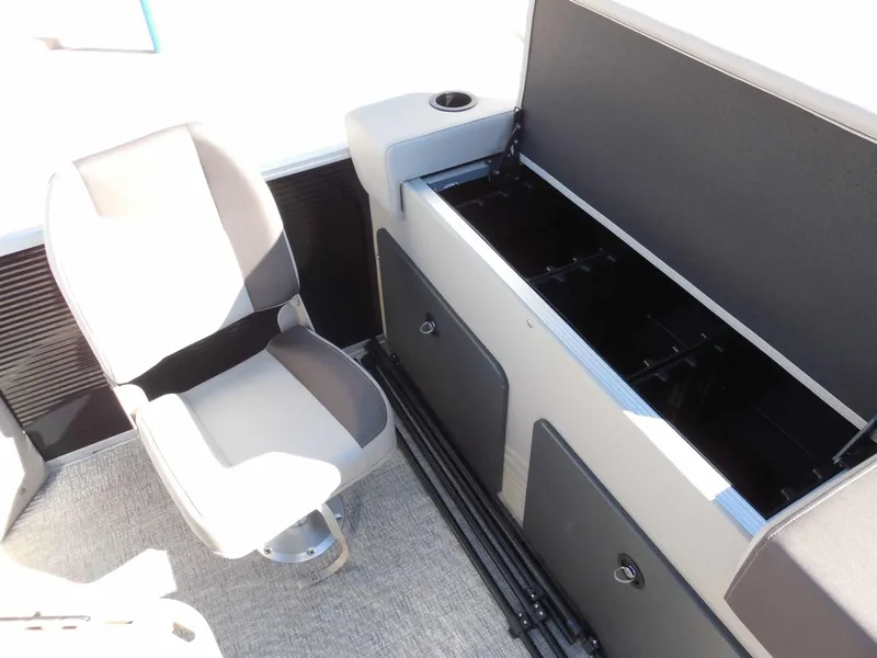 Slide: The Image of A modern boat seat and storage area with gray and black accents. - 19