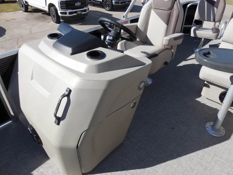 Slide: The Image of The image shows the cockpit of a 2027 Bennington 22 SF Tri Toon with a comfortable seat. - 15