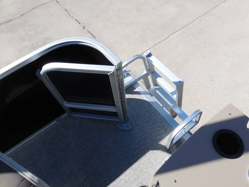 Slide: The Image of View of the entry ladder and flooring of a 2027 Bennington 22 SF Tri Toon. - 21