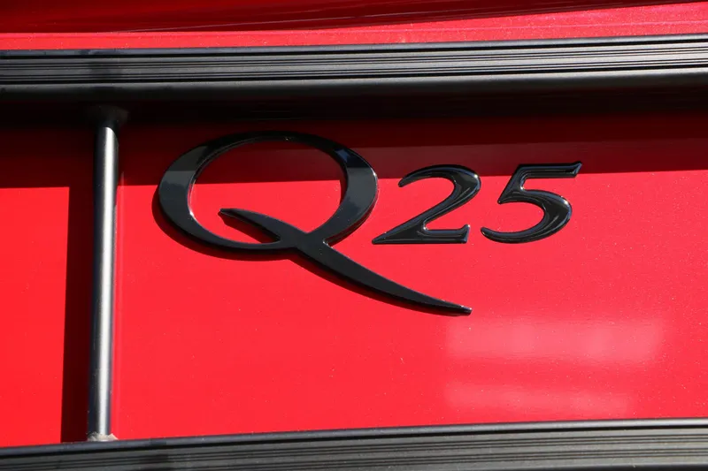Slide: The Image of Close-up of the "Q25" logo on a red boat. - 18