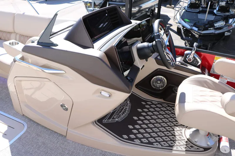 Slide: The Image of The image shows the cockpit of a 2027 Bennington 25 QSBA Tri Toon with a modern design. - 45