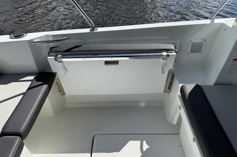 Slide: The Image of Interior view of 2022 Jeanneau NC 795 Series 2 boat seating area. - 21