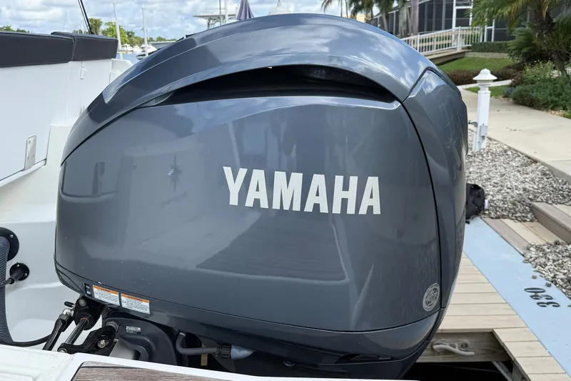 Slide: The Image of Yamaha outboard motor on a 2022 Jeanneau NC 795 Series 2 boat. - 25