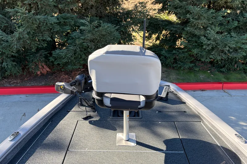 Slide: The Image of 2027 Tracker Pro Team 195 boat deck with seat and control panel. - 20