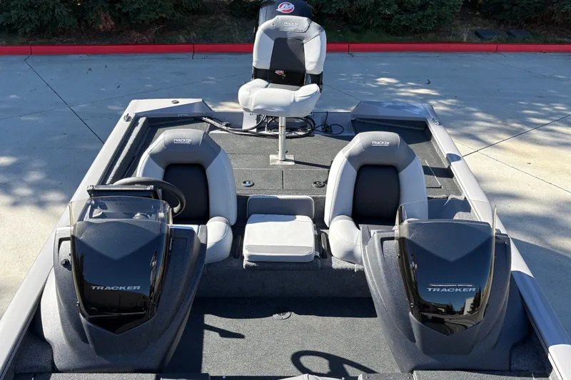 Slide: The Image of 2027 Tracker Pro Team 195 boat interior with seating and controls. - 16