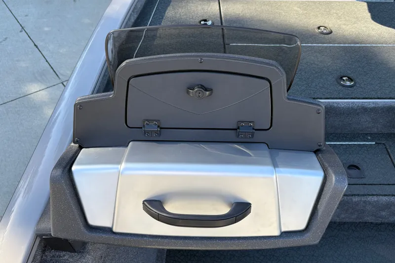 Slide: The Image of 2027 Tracker Pro Team 195 boat console with storage compartment and handle. - 27