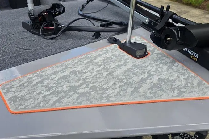 Slide: The Image of 2027 Tracker Bass Tracker Classic Limited boat deck with camo mat and Minn Kota trolling motor. - 15
