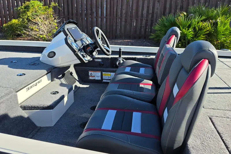 Slide: The Image of 2027 Ranger RT198P boat interior with modern dashboard and comfortable seating. - 18