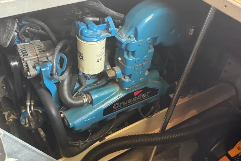Slide: The Image of Engine compartment of a 2002 Silverton 410 Sport Bridge with Crusader engine. - 55