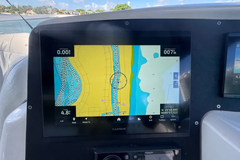 Slide: The Image of Garmin GPS navigation screen on a 2002 Silverton 410 Sport Bridge boat. - 18