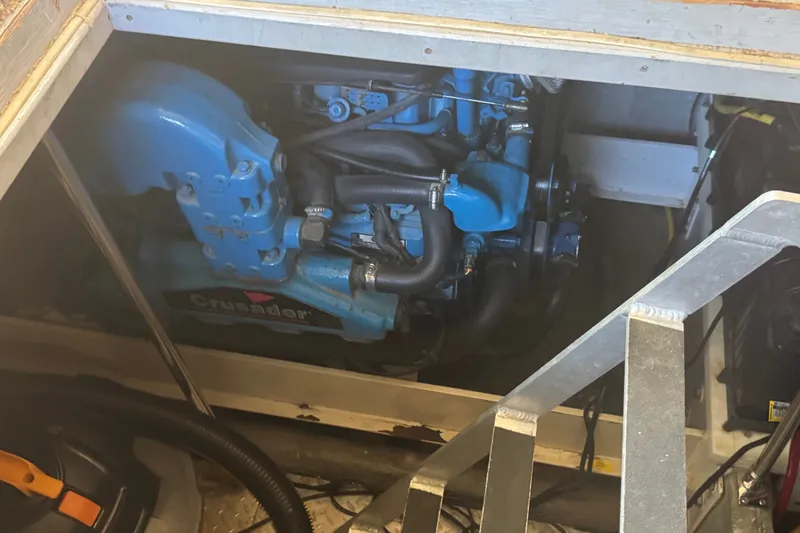 Slide: The Image of Engine compartment of a 2002 Silverton 410 Sport Bridge with a Crusader engine. - 52