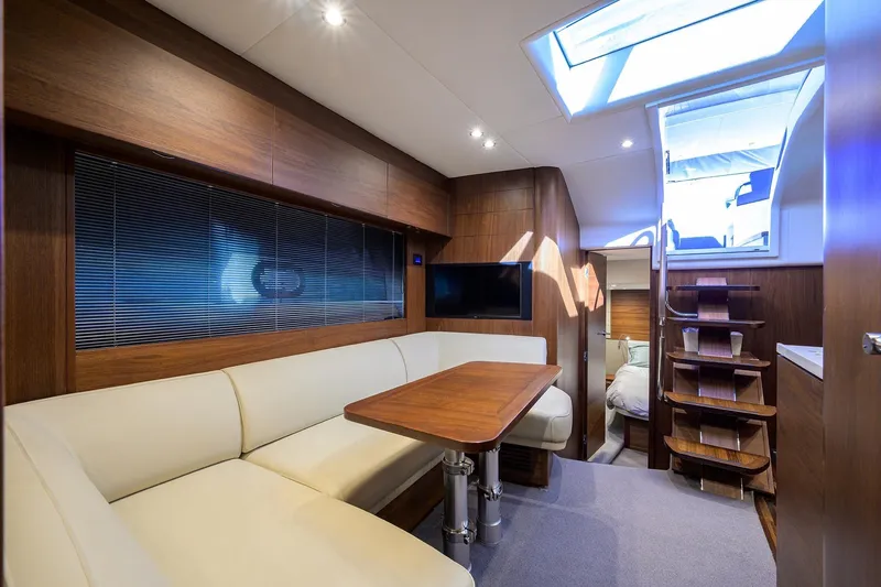 Slide: The Image of Luxurious interior of 2022 Princess V50 Open yacht with elegant seating and wooden finishes. - 3