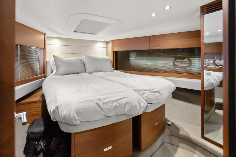 Slide: The Image of Luxurious cabin interior of 2022 Princess V50 yacht with modern design and comfortable bedding. - 29