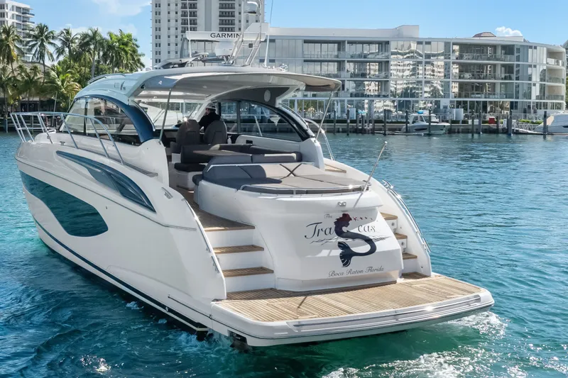Slide: The Image of Luxury 2022 Princess V50 yacht docked in scenic marina setting. - 33
