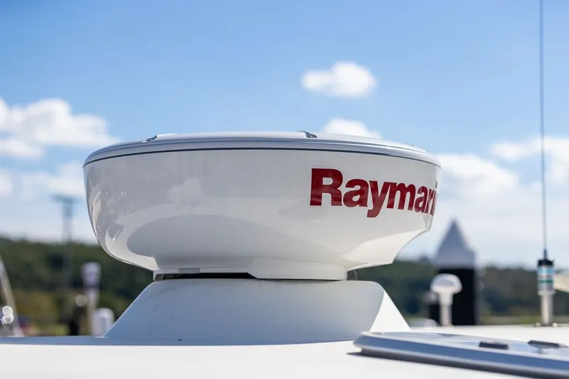 Slide: The Image of Radar system on 2000 Little Harbor WhisperJet 38 boat under blue sky. - 35