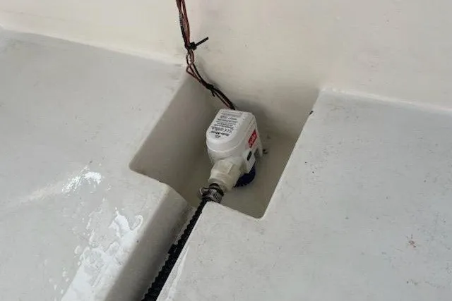 Slide: The Image of Bilge pump installation on 2005 Compton 33 Downeast Express HT boat. - 24
