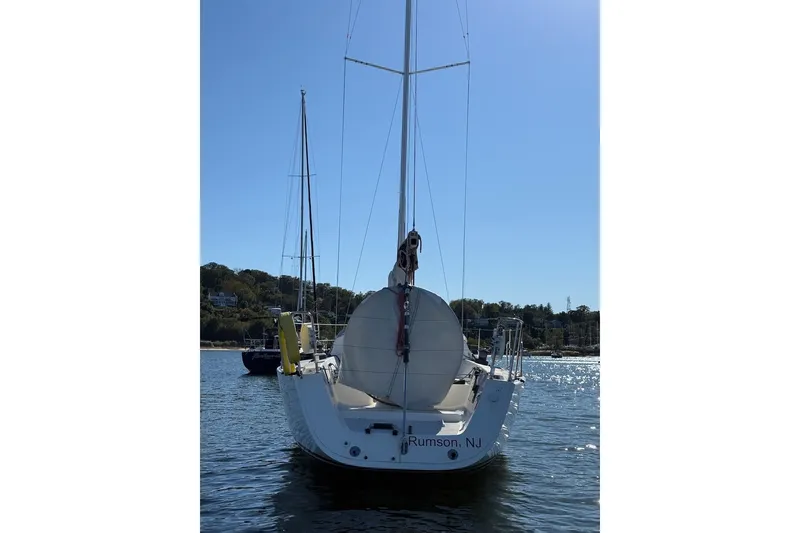 Slide: The Image of 2004 J Boats J/109 sailboat on water, Rumson, NJ, sunny day. - 5