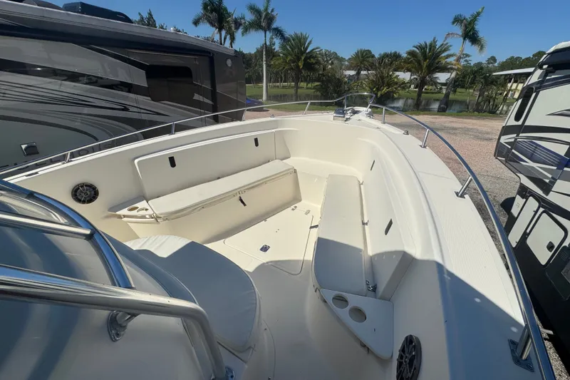 Slide: The Image of 2001 Pursuit 3070 Center Console boat with spacious seating and sleek design. - 42