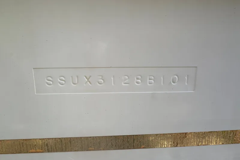 Slide: The Image of Hull identification number on a 2001 Pursuit 3070 Center Console boat. - 71