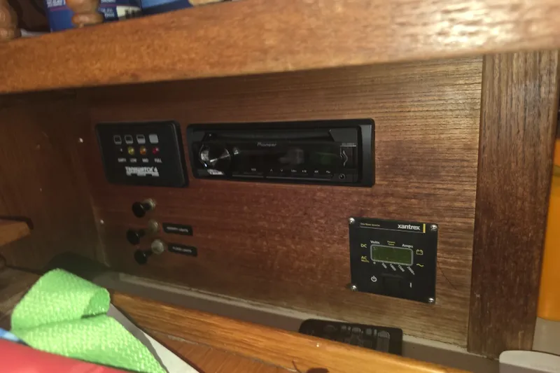 Slide: The Image of Control panel of a 1981 Lancer Motor Sailer with electronic displays and switches. - 15