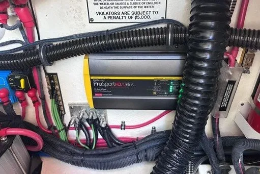 Slide: The Image of ProSport HD20 Plus charger in 2019 Formula 310 Bowrider boat engine compartment. - 14