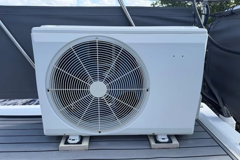 Slide: The Image of Air conditioning unit on 1987 Bluewater Yachts Coastal Cruiser 51 deck. - 59
