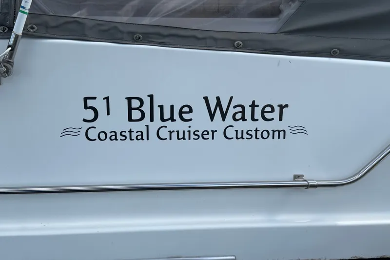 Slide: The Image of 1987 Bluewater Yachts Coastal Cruiser 51, custom design detail on hull. - 61