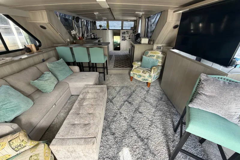 Slide: The Image of Interior of 1987 Bluewater Yachts Coastal Cruiser 51 with modern furnishings and spacious layout. - 27