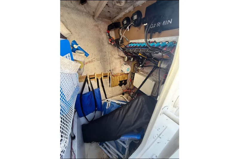 Slide: The Image of Interior of a 2004 Sea Fox 257 Center Console boat with equipment and electronics. - 11