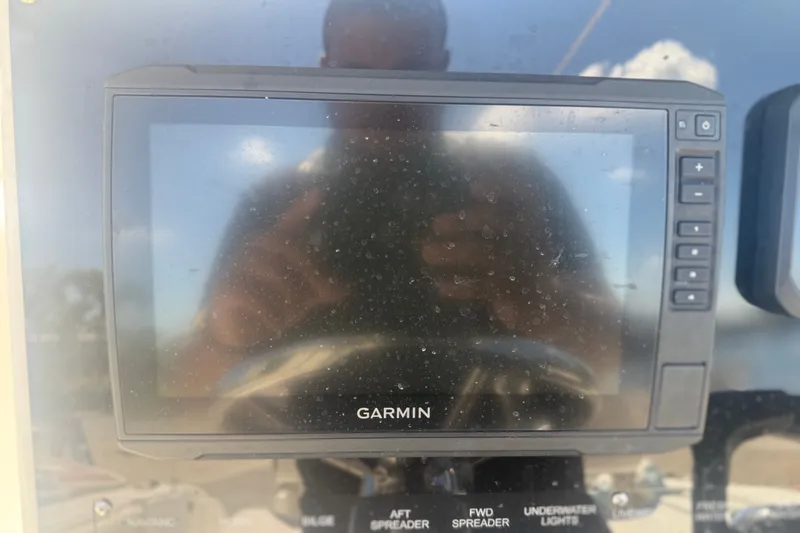 Slide: The Image of Garmin marine GPS on 2004 Sea Fox 257 Center Console boat dashboard. - 21
