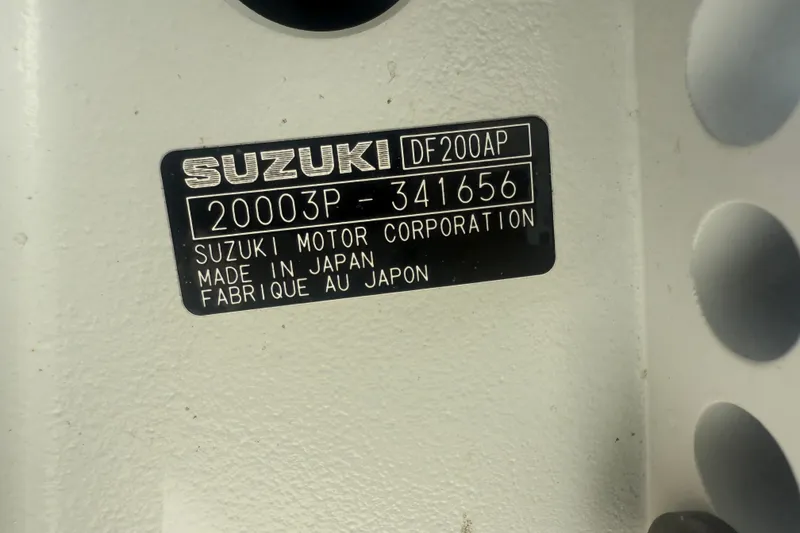 Slide: The Image of Suzuki DF200AP engine label on 2004 Sea Fox 257 Center Console boat. - 57