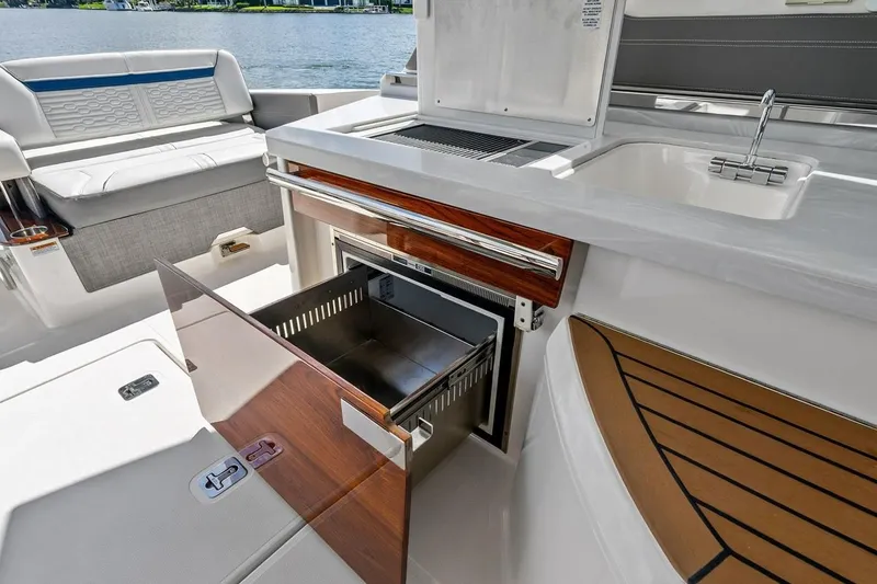 Slide: The Image of Luxury interior of 2020 Tiara 38 LX yacht with open drawer and sink. - 21
