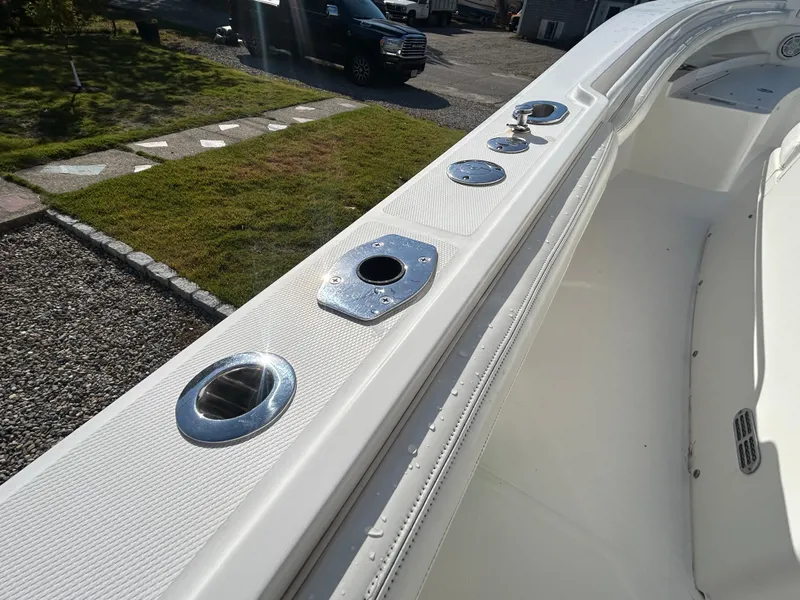 Slide: The Image of The image shows the deck of a 2020 Regulator 23 boat with stainless steel fittings. - 26