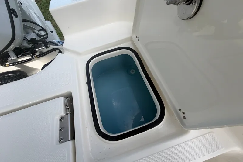 Slide: The Image of Livewell compartment on a 2027 Pioneer 220 Bay Sport boat. - 18