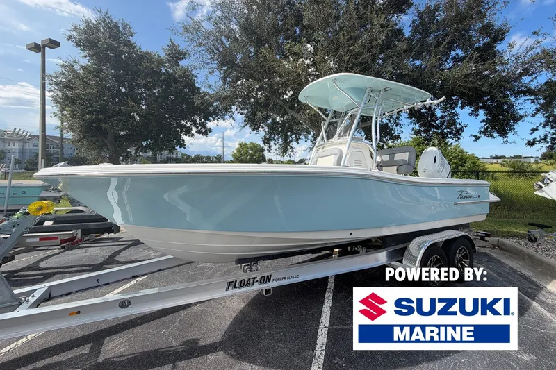 Slide: The Image of 2027 Pioneer 220 Bay Sport boat on trailer, powered by Suzuki Marine. - 1