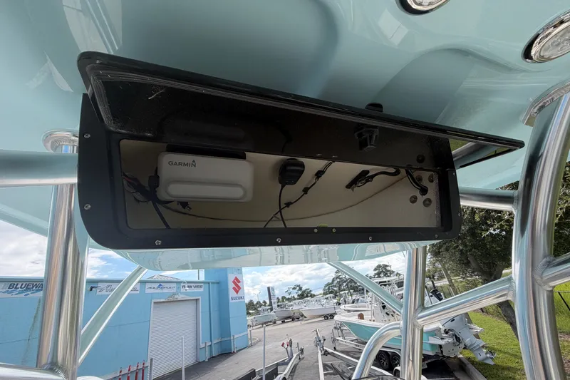 Slide: The Image of Pioneer 220 Bay Sport 2027 boat console with Garmin electronics and stainless steel frame. - 8