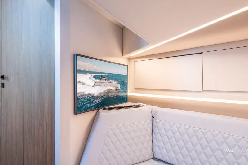 Slide: The Image of Luxurious interior of 2025 Vanquish Yachts VQ55 with modern seating and wall art. - 39