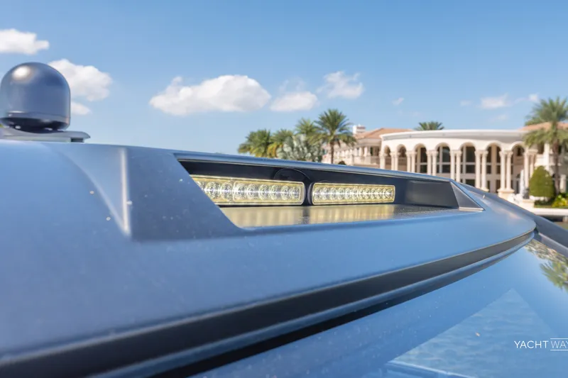 Slide: The Image of Close-up of 2025 Vanquish Yachts VQ55 with sleek design and modern lighting. - 26