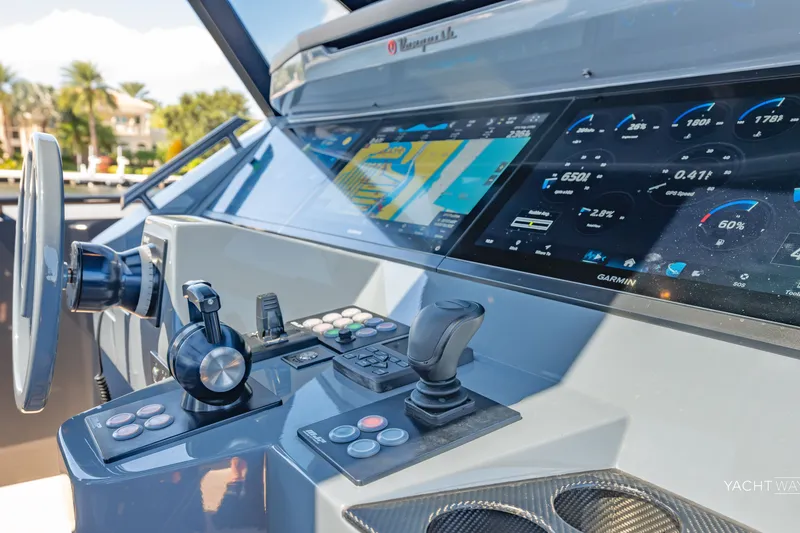 Slide: The Image of Helm of 2025 Vanquish Yachts VQ55 with advanced navigation and control systems. - 34