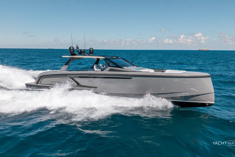 Slide: The Image of 2025 Vanquish Yachts VQ55 cruising on open sea under clear skies. - 4