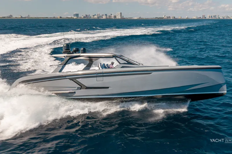 Slide: The Image of 2025 Vanquish Yachts VQ55 cruising on open water, showcasing sleek design and performance. - 10