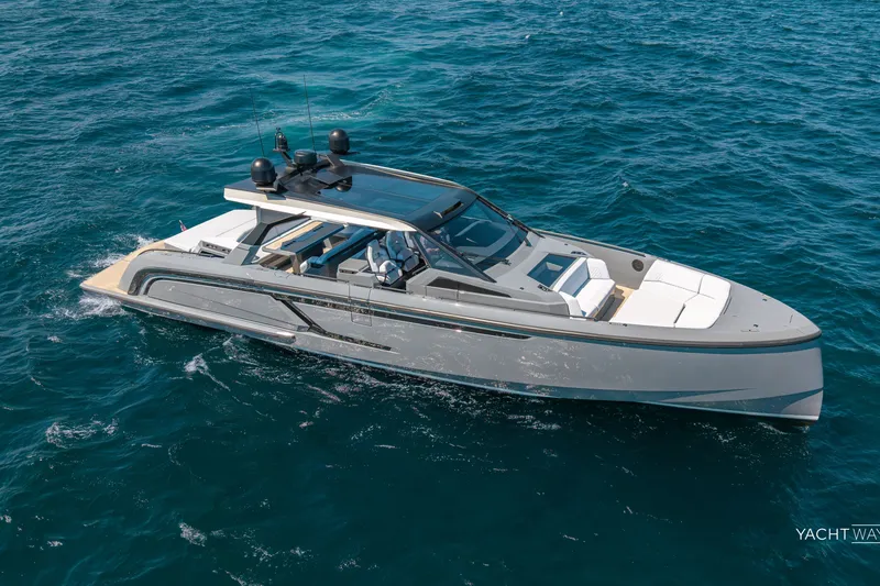 Slide: The Image of 2025 Vanquish Yachts VQ55 cruising on open sea, sleek design and modern features. - 12