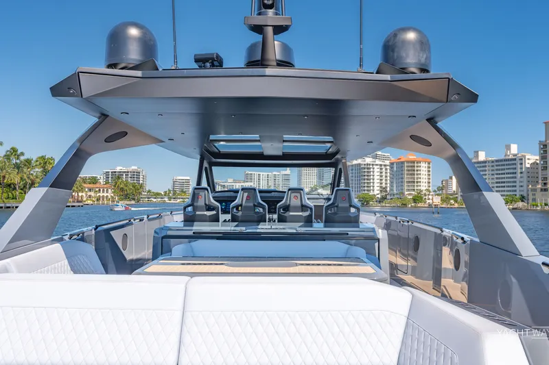 Slide: The Image of 2025 Vanquish Yachts VQ55 luxury yacht interior with modern seating and waterfront view. - 28