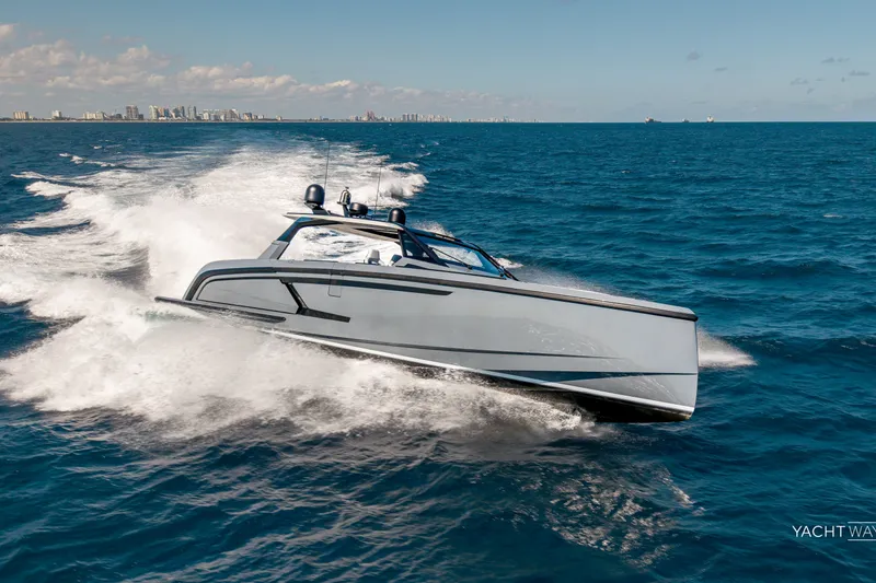 Slide: The Image of 2025 Vanquish Yachts VQ55 cruising on open ocean, showcasing sleek design and powerful performance. - 9