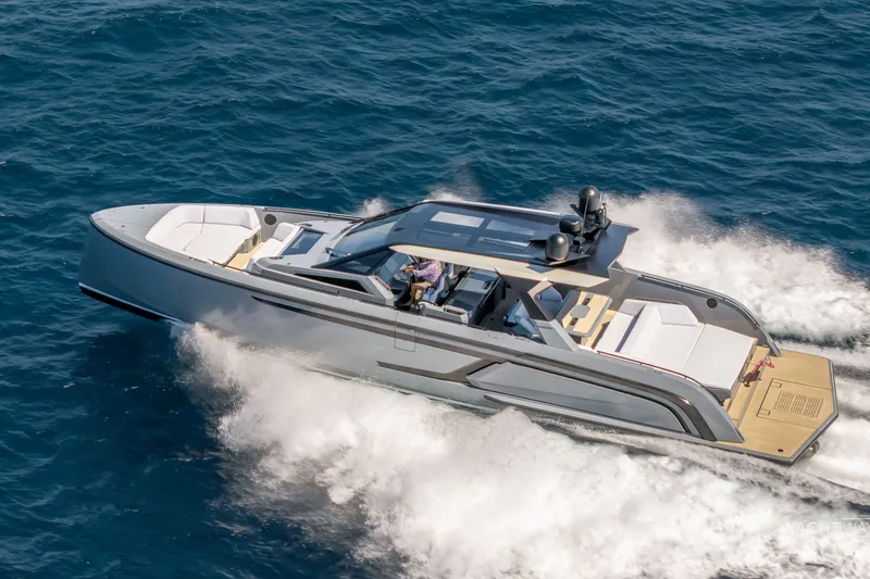 Slide: The Image of 2025 Vanquish Yachts VQ55 cruising on open sea, showcasing sleek design and luxury features. - 7