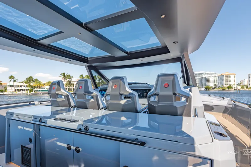 Slide: The Image of 2025 Vanquish Yachts VQ55 cockpit with sleek design and panoramic views. - 30