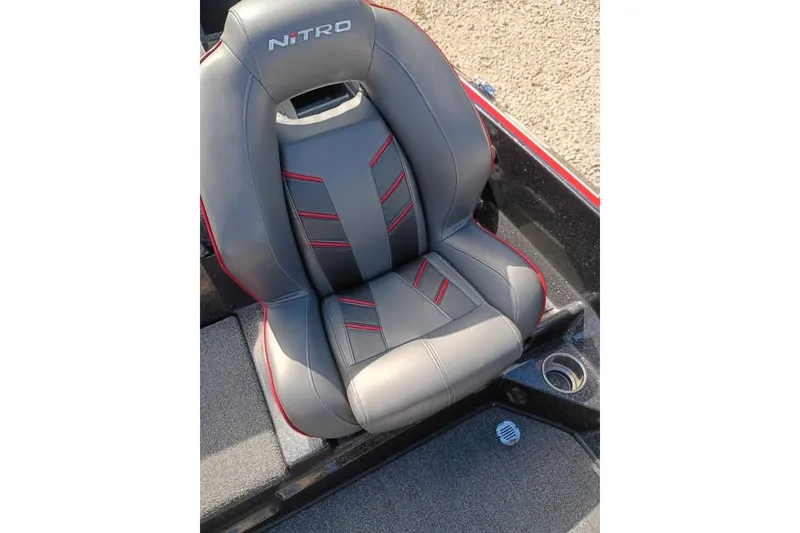 Slide: The Image of Gray and red seat of 2020 Nitro Z21 Pro boat, featuring sleek design. - 12
