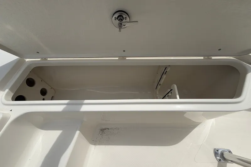 Slide: The Image of Open storage compartment on a 2027 Bulls Bay 2200 XS boat. - 11